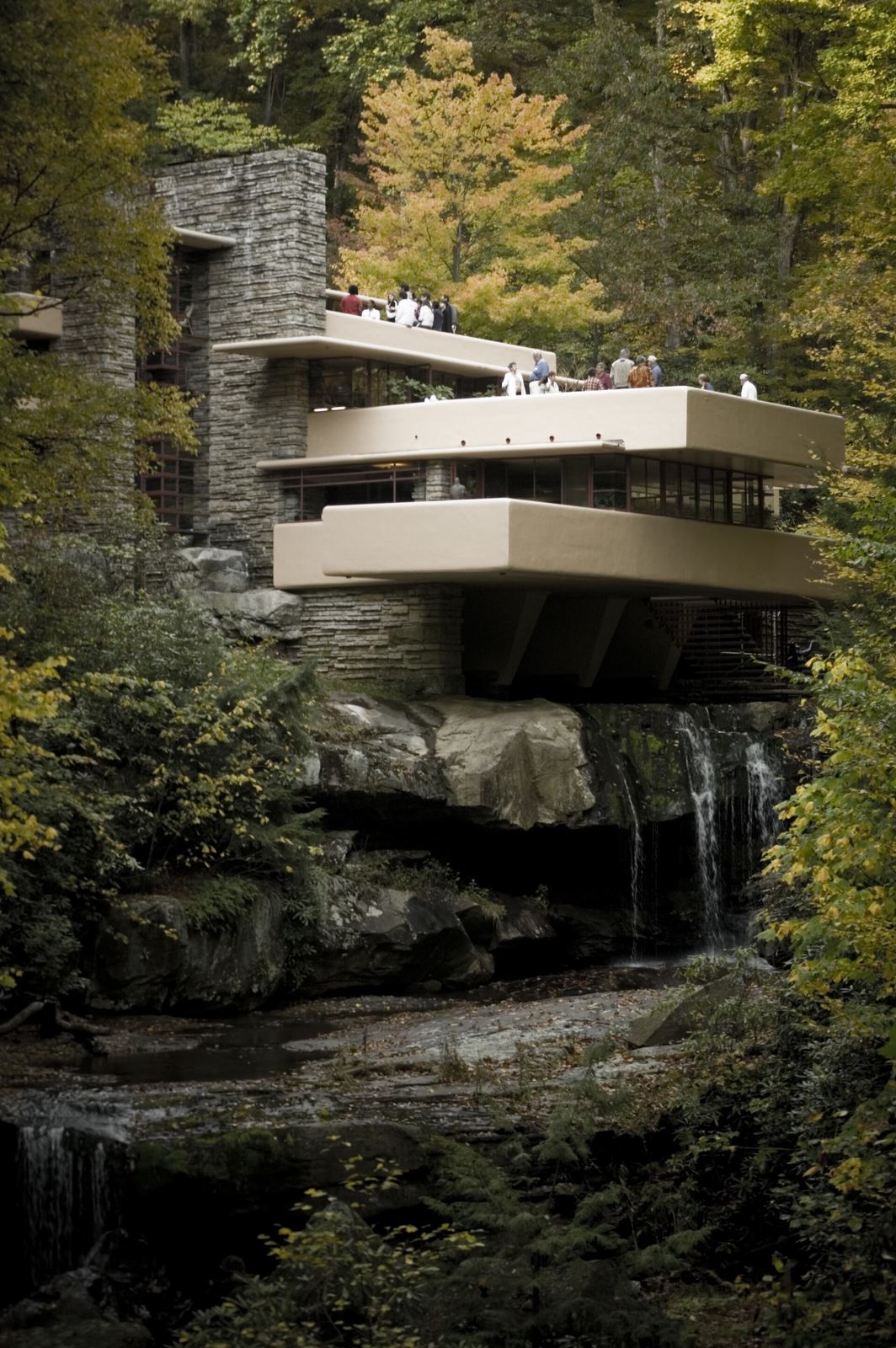 Fallingwater’s concrete terraces projecting above the stream.