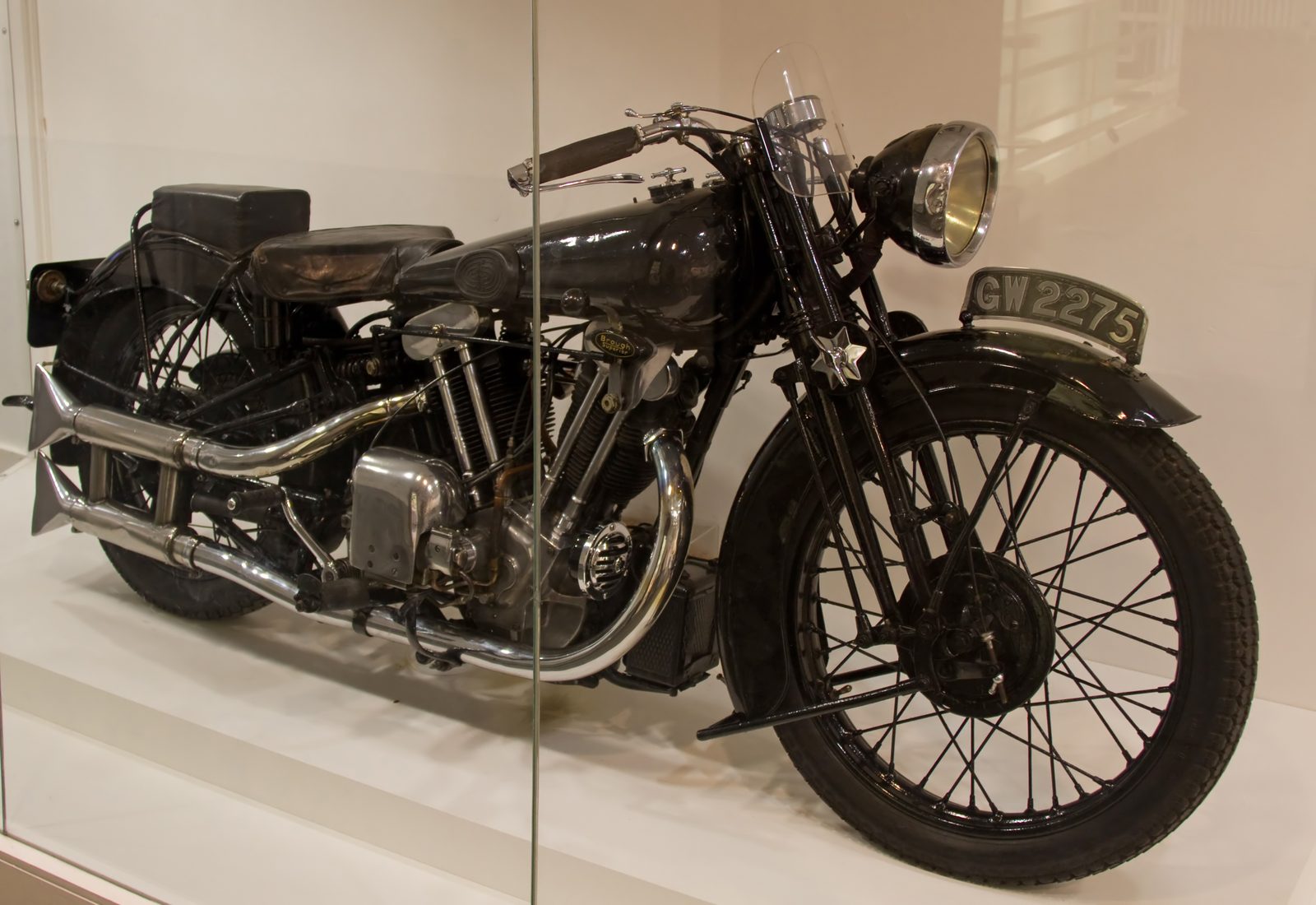 Lawrence’s restored Brough Superior SS100 displayed in a museum.