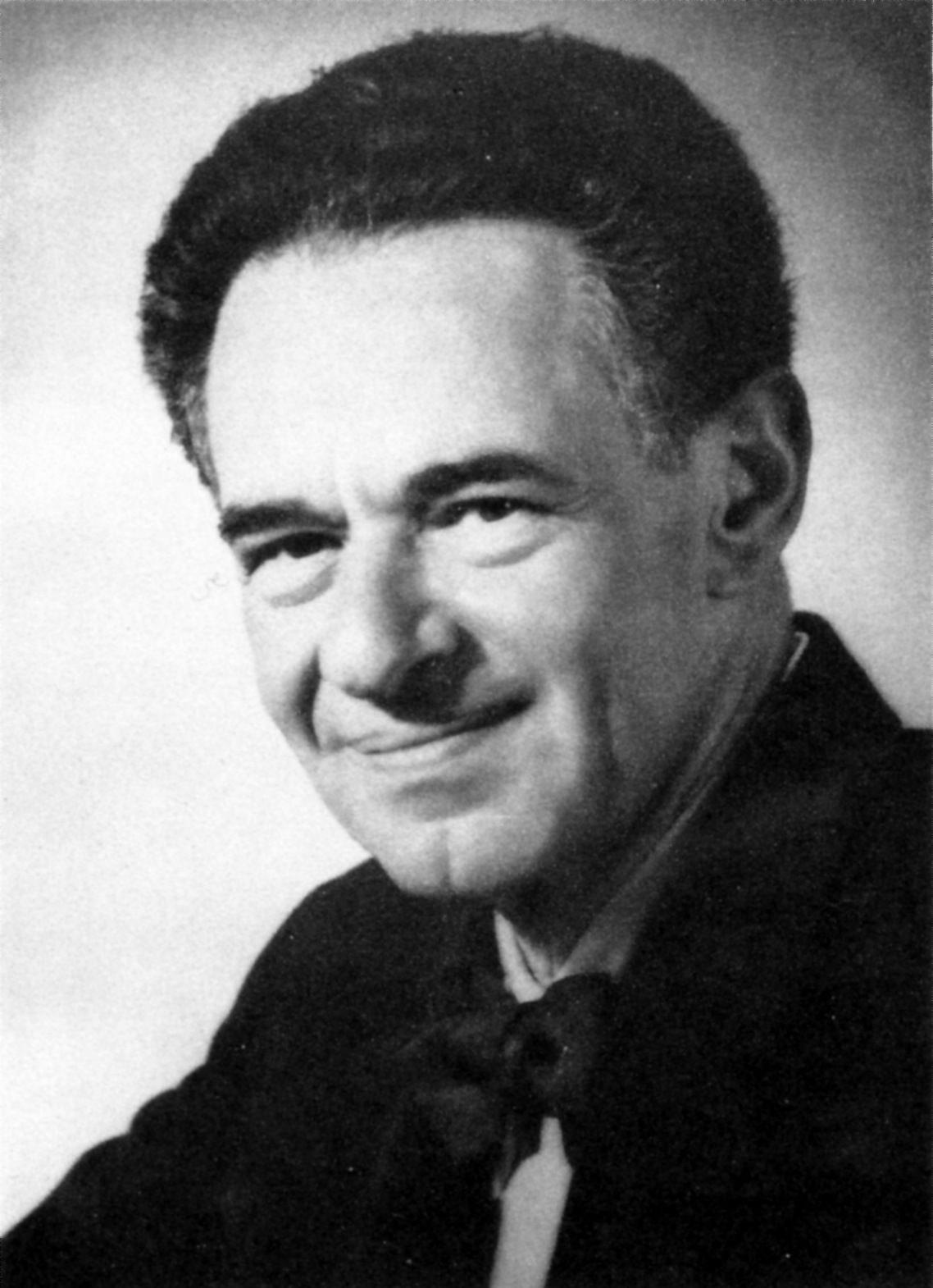 Fritz Lipmann smiling in his 1953 Nobel portrait.